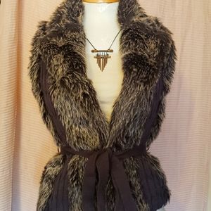 XOXO faux fur sweater vest with tie. XL. Worn. 20$. Not sure of original price.